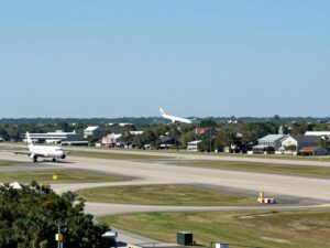 View of Charleston with planes demonstrating new flight routes